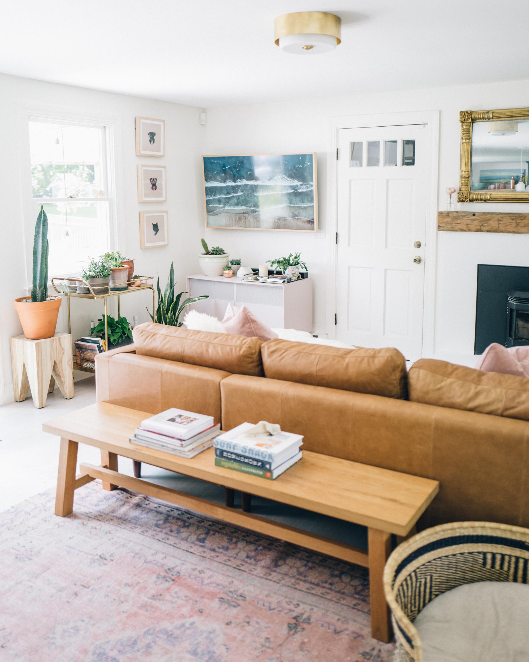 Jess Ann Kirby's most recent living room renovations include an updated fireplace and a new sectional.