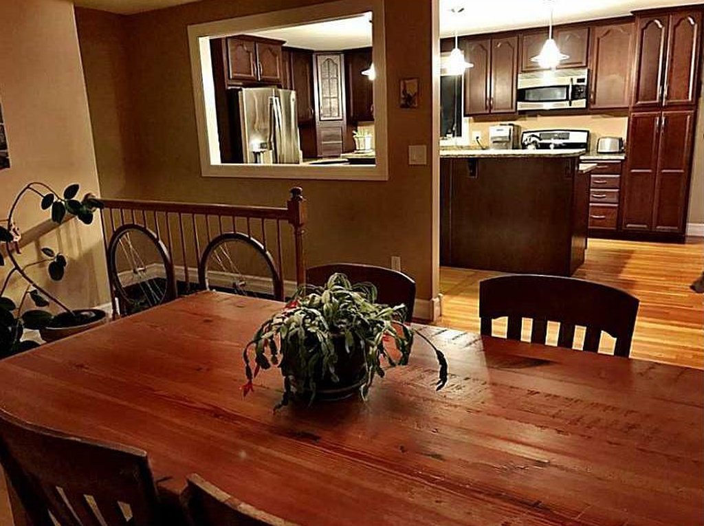 Jess Ann Kirby shares 'before' pictures of her dining room when it was first listed for sale.