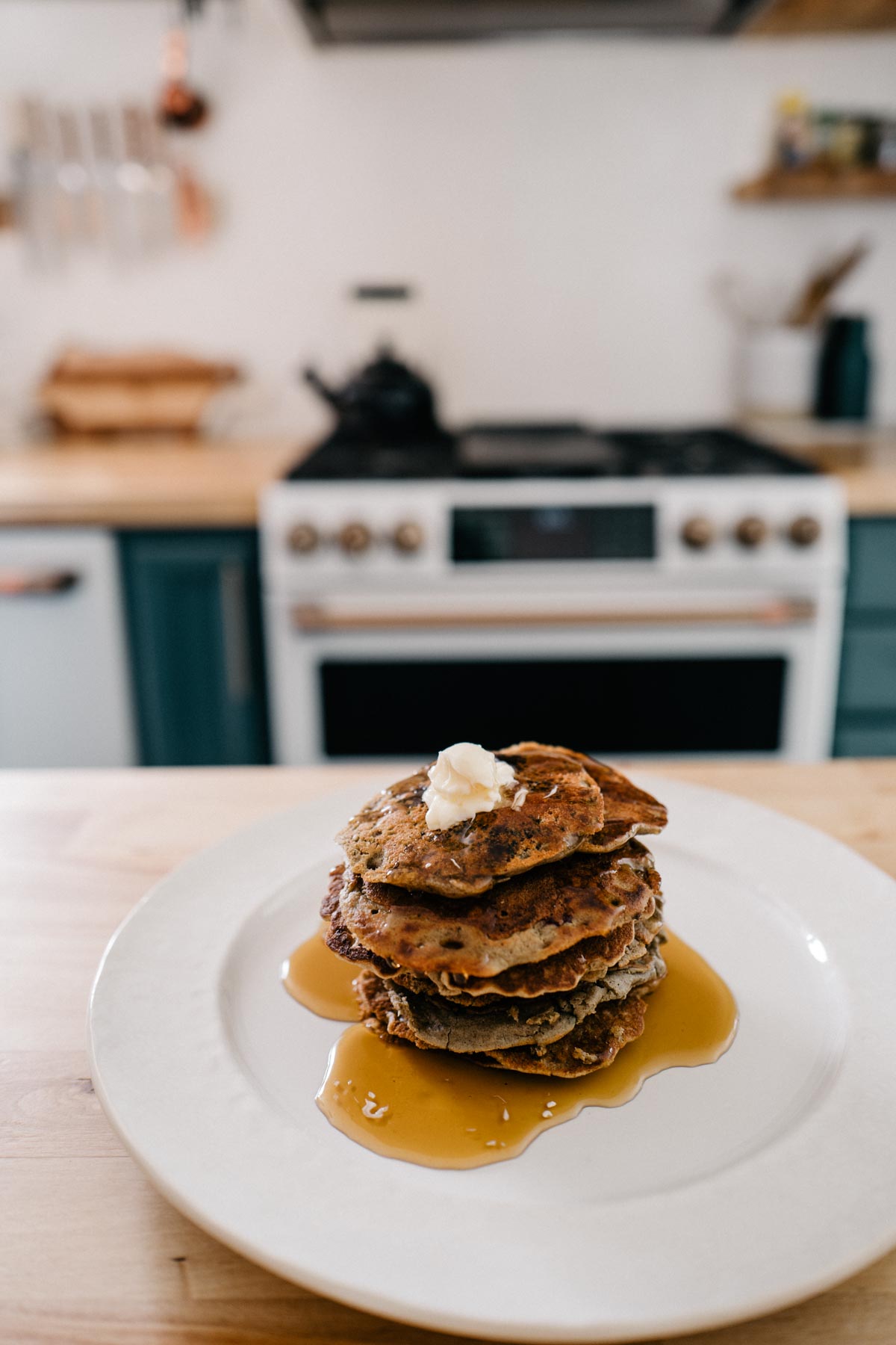 Jess Ann Kirby cooks vegan pancakes with berries regularly thanks to her Cafe Appliances stovetop griddle.