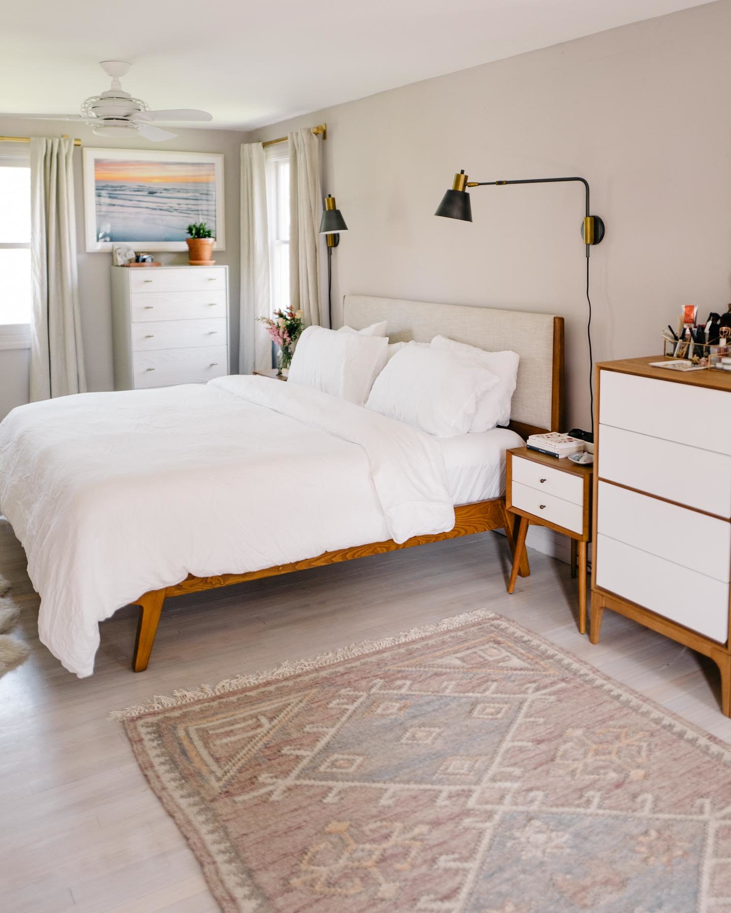 Jess Ann Kirby removed clutter and added bedside sconces for a mini bedroom makeover.