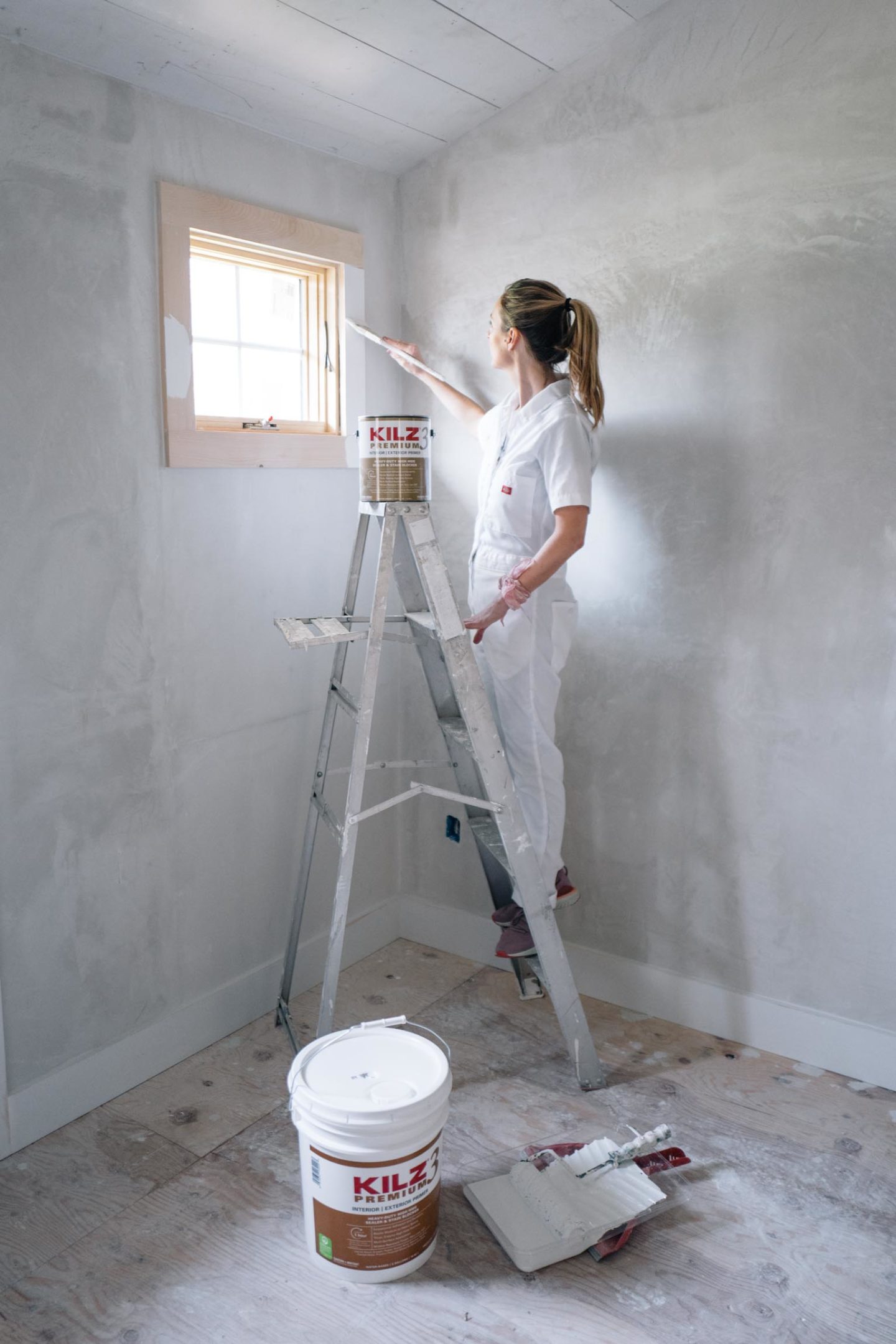 Jess painting walls