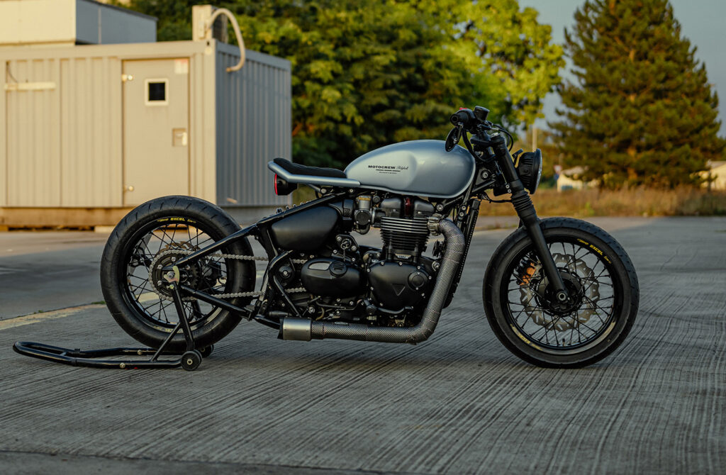 Triumph Bobber built to match a slammed Porsche 911.